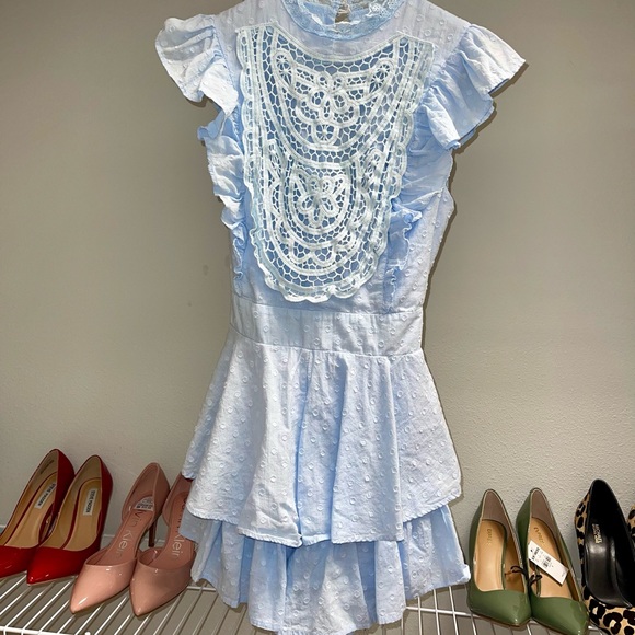 Saints + Secrets 
Size Small 
Baby blue ruffle romper 
100% cotton - Picture 3 of 4